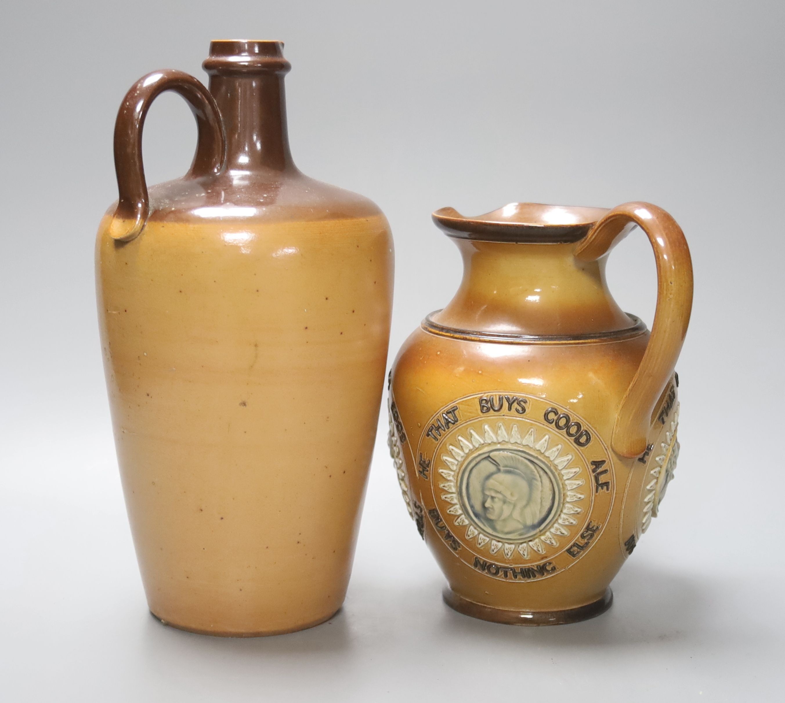 A Doulton Lambeth Angus Mackay's N.Y.O. stoneware flagon, 26cm, and a similar motto jug, 19cm
